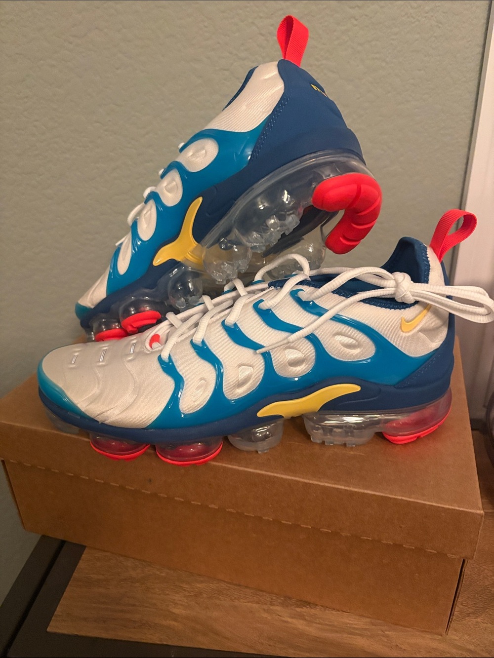 Nike White & Blue Sneakers with Yellow Swoosh and Neon Coral Accents